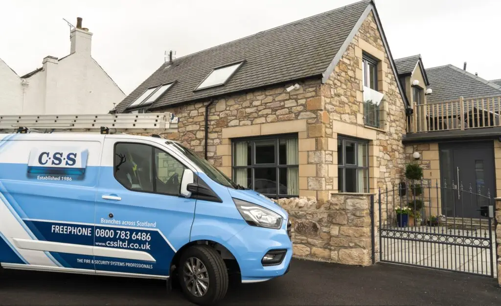 css van outside large home - IDES home intruder alarms